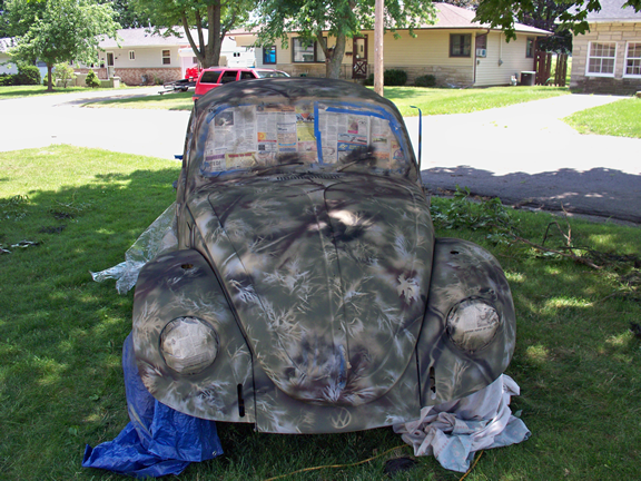 69 VW Beetle with Brown and Black laid down